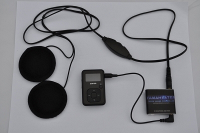 Shows hook up of Helmet Speakers, MP3 Player, and optional Amplifier